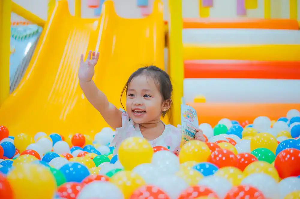 Colorful wavy slides in an indoor playground